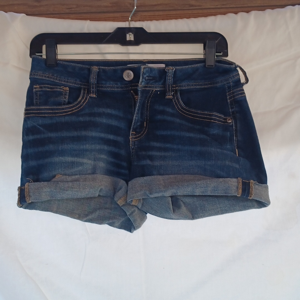 Cut off cuffed dark denim shorts